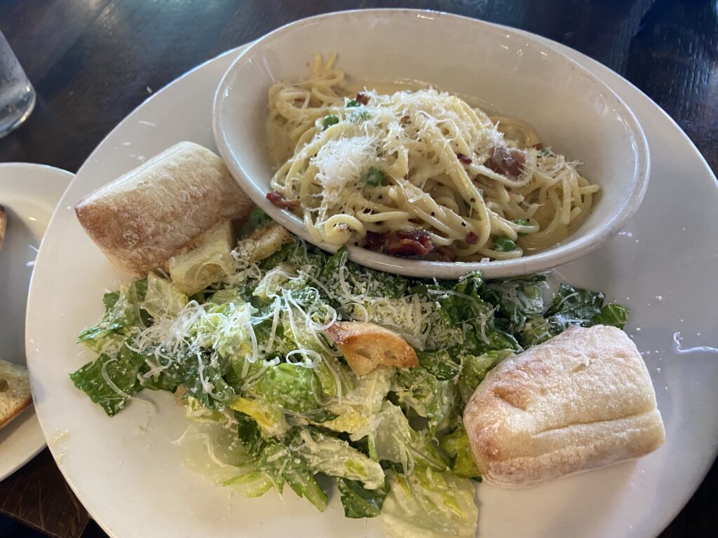 Spaghetti. Carbonara with a side Caesar salad. 