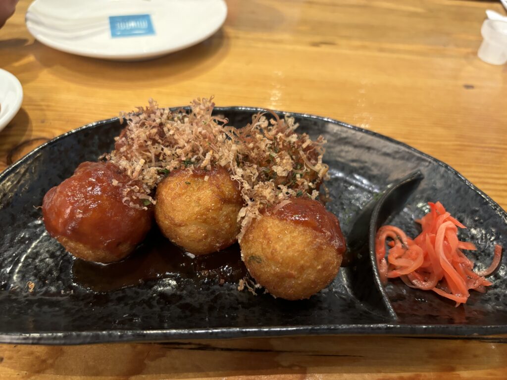 Takoyaki - octopus dumplings with takoyaki sauce